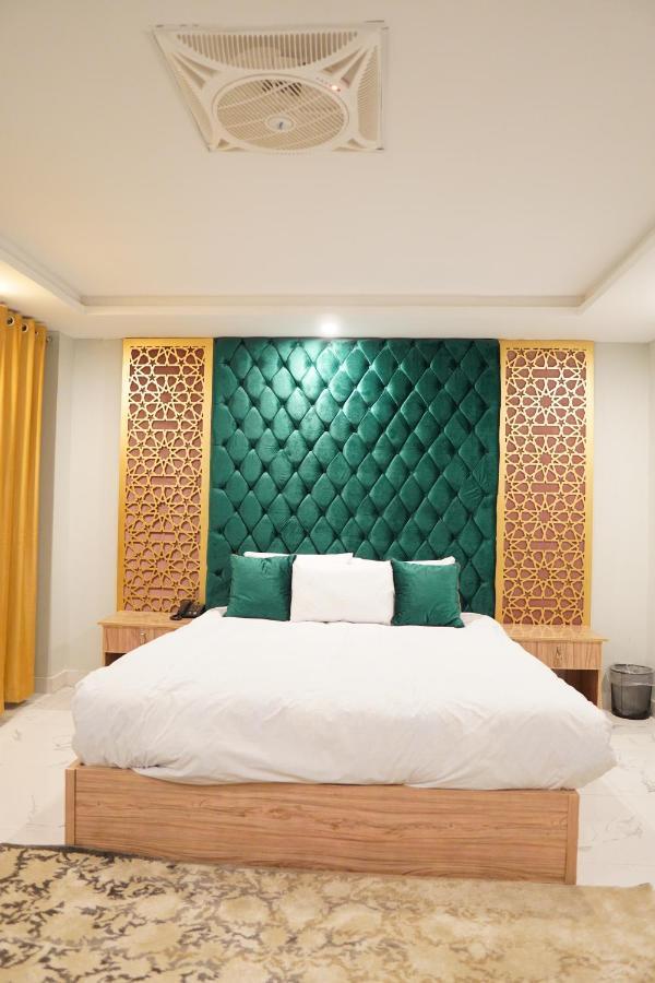 Nueva Hotel Islamabad Bagian luar foto